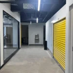 Indoor storage unit hallway at Beehive Storage
